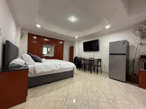 Patong Condotel - 8th Floor - 28 SQM - King bed, Kitchen, Private Bathroom, Seating Area, TV with Free WIFI, walking distance to the Beach